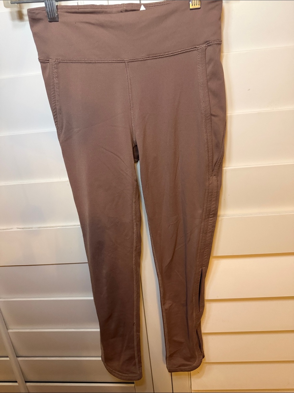 FP Movement by Free People Mauve Brown High-Waist Leggings. Cutout detail.